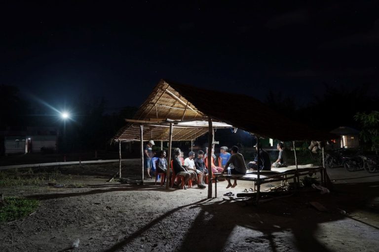 Warga di Pulau Buru melakukan pertemuan warga di malam hari dengan tersambungnya akses lampu